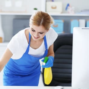 Cleaner preparing a workspace
